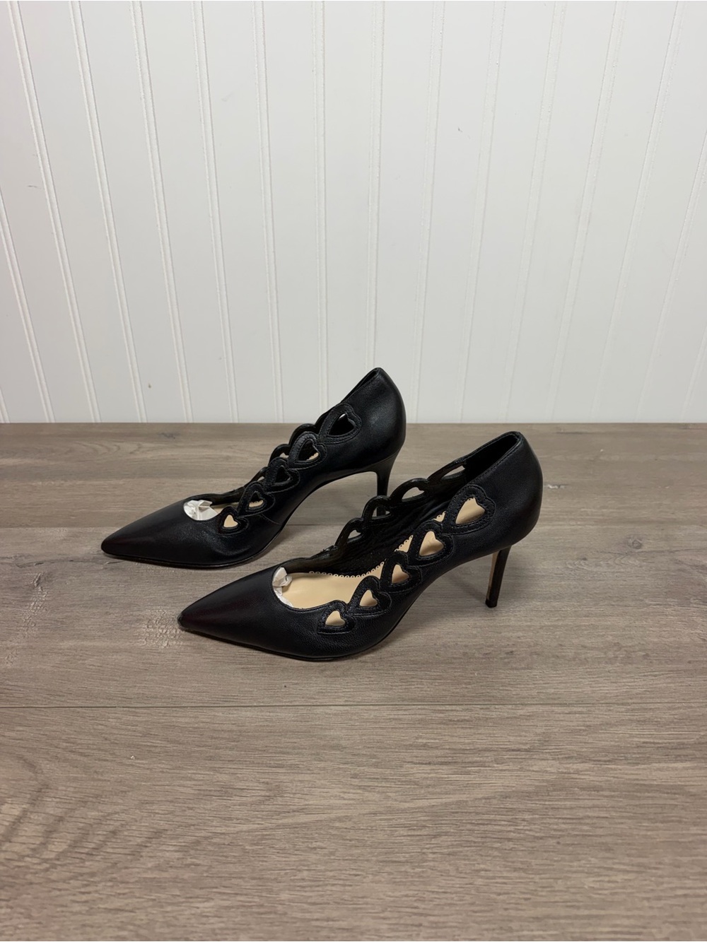 Used Cinq à Sept black Margot pumps, featuring distinct heart-shaped  size 38